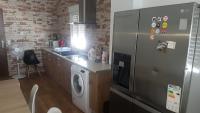 Kuchyňa alebo kuchynka v ubytovaní apartamento el molino con piscina privada