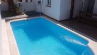 Bazén v ubytovaní apartamento el molino con piscina privada alebo v jeho blízkosti