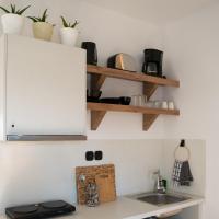 Kuchyň nebo kuchyňský kout v ubytování Kanso Rooms