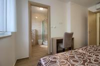 Posteľ alebo postele v izbe v ubytovaní Charming villa Aurora with private pool 200m from the beach for up to 10 persons - WiiBuk