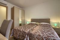 Posteľ alebo postele v izbe v ubytovaní Charming villa Aurora with private pool 200m from the beach for up to 10 persons - WiiBuk