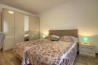 Posteľ alebo postele v izbe v ubytovaní Charming villa Aurora with private pool 200m from the beach for up to 10 persons - WiiBuk