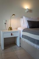 Postel nebo postele na pokoji v ubytování Kanso Rooms