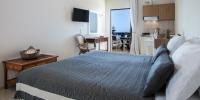 Postel nebo postele na pokoji v ubytování Kanso Rooms
