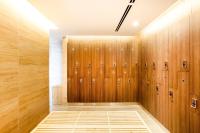 a locker room with wooden walls and lockers at Crowne Plaza Vientiane by IHG in Vientiane