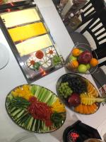 three bowls of fruits and vegetables on a counter at Residence St Havel Prague Old Town in Prague