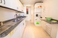 Kuchyň nebo kuchyňský kout v ubytování Precioso Apartamento con wifi y A/C