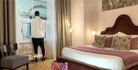 Postel nebo postele na pokoji v ubytování INTOMILAN Galleria Duomo I Boutique & Design Aparthotel