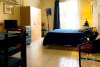 Łóżko lub łóżka w pokoju w obiekcie Casa Marisa