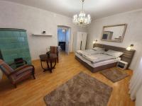 Łóżko lub łóżka w pokoju w obiekcie Corte Apartman
