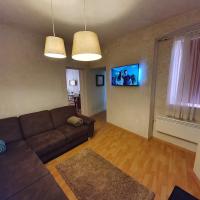 Telewizja i/lub zestaw kina domowego w obiekcie Corte Apartman