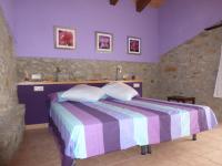 A bed or beds in a room at Can Mahola