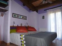 A bed or beds in a room at Can Mahola