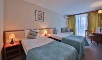 Postel nebo postele na pokoji v ubytování Hotel Laguna Garden