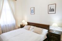 Posteľ alebo postele v izbe v ubytovaní White & Gray Apartments