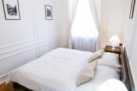 Posteľ alebo postele v izbe v ubytovaní White & Gray Apartments