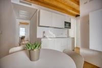 A kitchen or kitchenette at Ca' dei Battuti Apartments