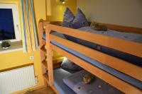 A bed or beds in a room at Ferienhaus Christine