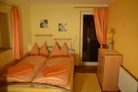 A bed or beds in a room at Ferienhaus Christine
