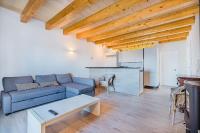A seating area at Beachfront Villa Es Clot by Sealand Villas