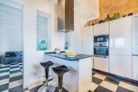 A kitchen or kitchenette at Beachfront Villa Es Clot by Sealand Villas