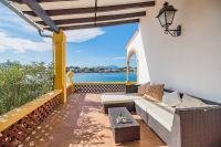 A balcony or terrace at Beachfront Villa Es Clot by Sealand Villas
