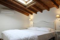 A bed or beds in a room at Cascina Volta