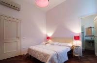 A bed or beds in a room at Cascina Volta