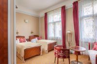 Postel nebo postele na pokoji v ubytování Hotel Paris Prague