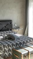 Posteľ alebo postele v izbe v ubytovaní Agriresort Villa Gelso- Adults Friendly