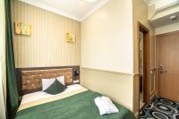 Mildom Hotelにあるベッド