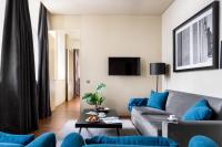 TV a/nebo společenská místnost v ubytování JOIVY Downtown Market Apartments