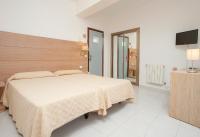 Postel nebo postele na pokoji v ubytování Hotel Ibiza Playa