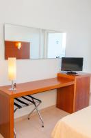 TV a/nebo společenská místnost v ubytování Hotel Ibiza Playa