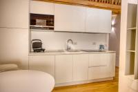 A kitchen or kitchenette at Ca' dei Battuti Apartments