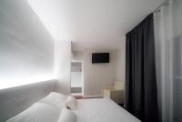 Postel nebo postele na pokoji v ubytování El Pi de Sant Just - Habitacions i Apartaments