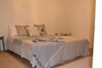 A bed or beds in a room at Ai due Mori Apt by Addler House Ospitality