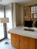 Posteľ alebo postele v izbe v ubytovaní Studio Miramar Suites Malaga
