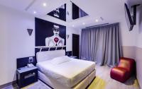 Cama o camas de una habitación en Zouk Hotel