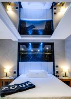 Cama o camas de una habitación en Zouk Hotel