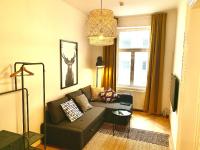 Posezení v ubytování Contemporary City Apartment - by Nahuen Suites