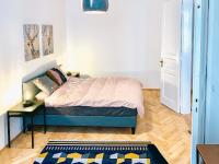 Postel nebo postele na pokoji v ubytování Contemporary City Apartment - by Nahuen Suites