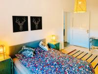 Postel nebo postele na pokoji v ubytování Contemporary City Apartment - by Nahuen Suites