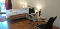 Postel nebo postele na pokoji v ubytování Apartments Toni