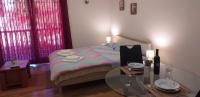 Postel nebo postele na pokoji v ubytování Apartments Toni