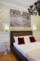 Posteľ alebo postele v izbe v ubytovaní Duomo Rooms