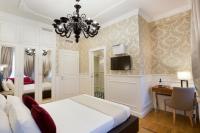 Posteľ alebo postele v izbe v ubytovaní Duomo Rooms