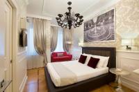 Posteľ alebo postele v izbe v ubytovaní Duomo Rooms