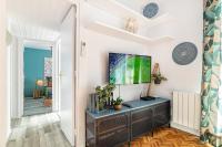 Televízia a/alebo spoločenská miestnosť v ubytovaní LIANA SEAVIEW & BEACH - apartment