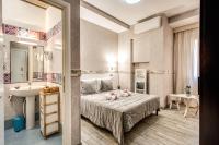 Posteľ alebo postele v izbe v ubytovaní Santamaria Inn